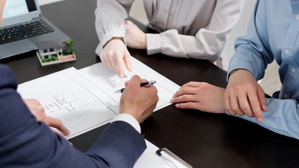 The hands of a businessman explaining real estate